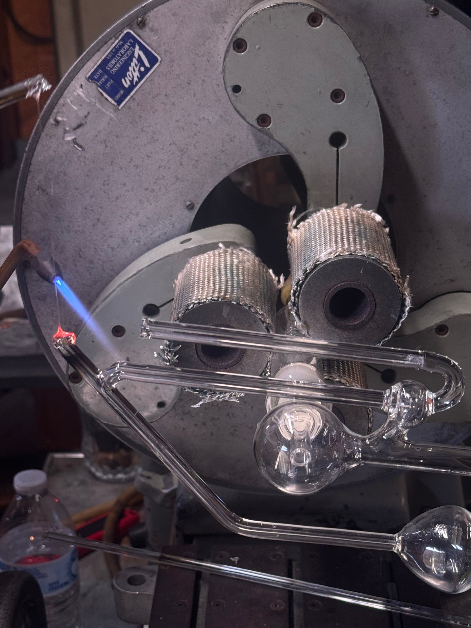 Close-up of a Glass component being repaired, likely part of a scientific or industrial